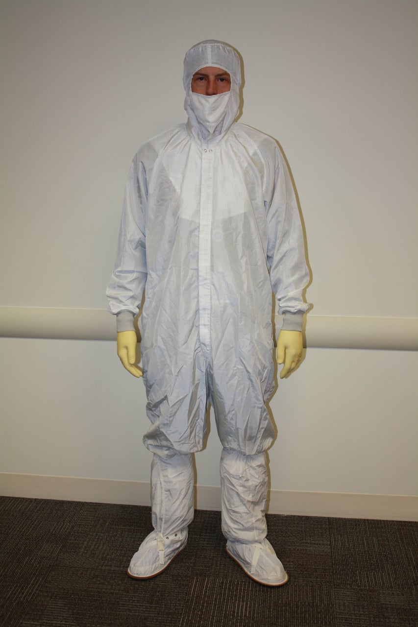 Jon wearing a white cleanroom bunny suit during his time at Intel
