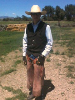 Jon in a cowboy hat on a Montana ranch